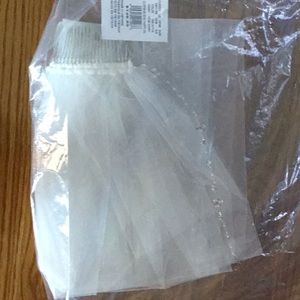 Beautiful ivory beaded fingertip veil.